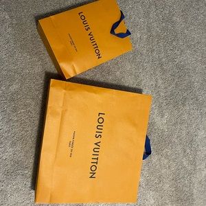 Authentic Louis Vuitton shopping bags and boxes